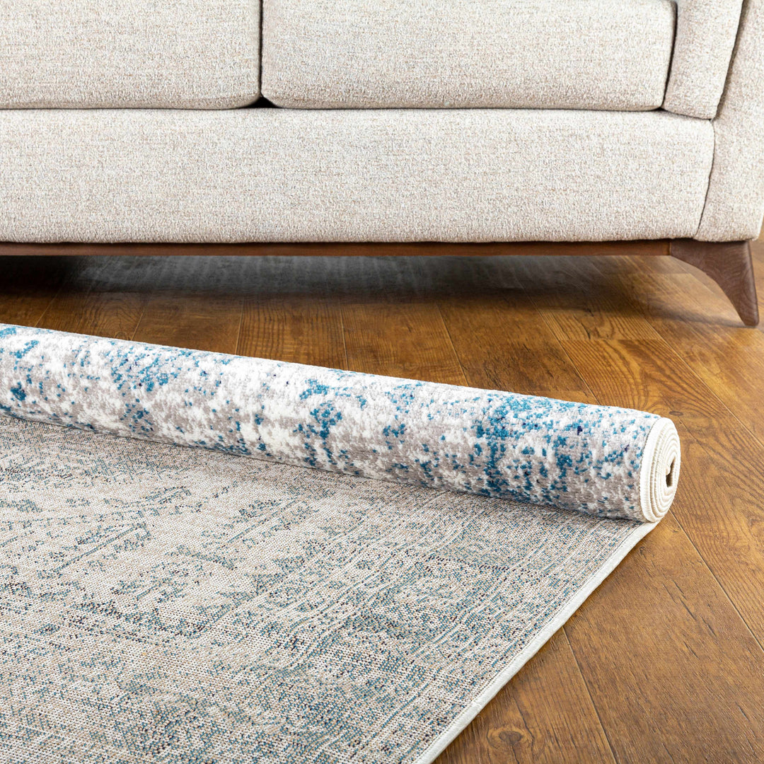 Inkom Traditional Style Ivory And Blue Area Rug