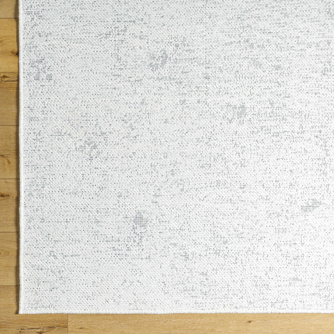 Isako Modern Solid Design White Washable Area Rug - The Rug Decor