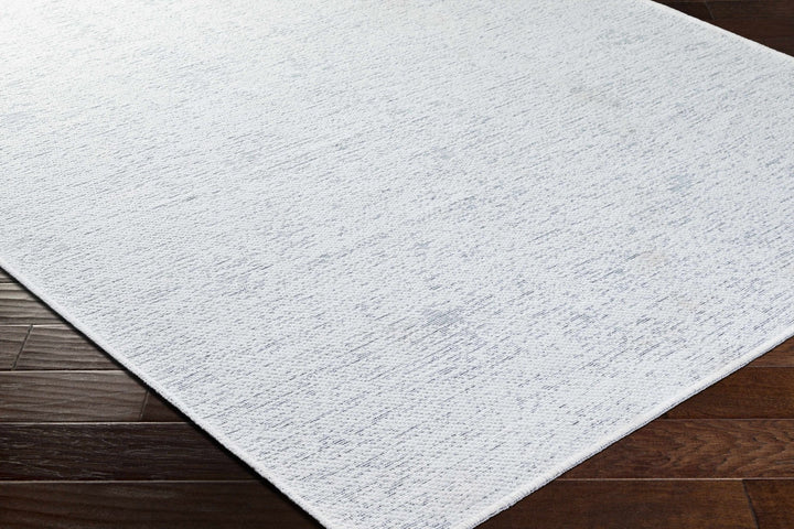 Isako Modern Solid Design White Washable Area Rug - The Rug Decor