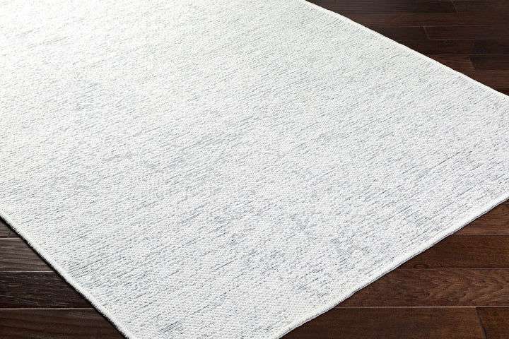 Isako Modern Solid Design White Washable Area Rug - The Rug Decor
