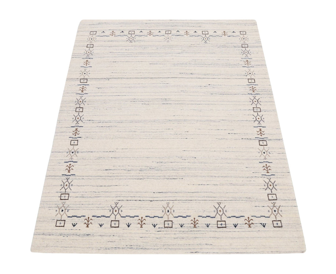 Ivory And Blue Tribal Border Design Hand Loomed Wool Area Rug - The Rug Decor