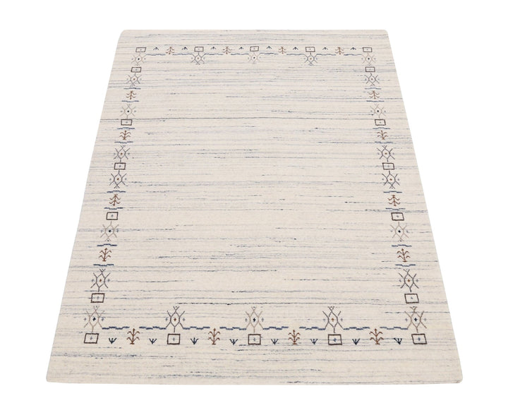 Ivory And Blue Tribal Border Design Hand Loomed Wool Area Rug - The Rug Decor