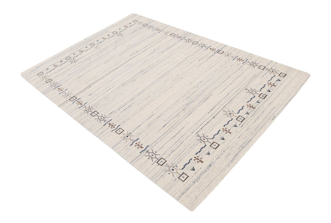 Ivory And Blue Tribal Border Design Hand Loomed Wool Area Rug - The Rug Decor
