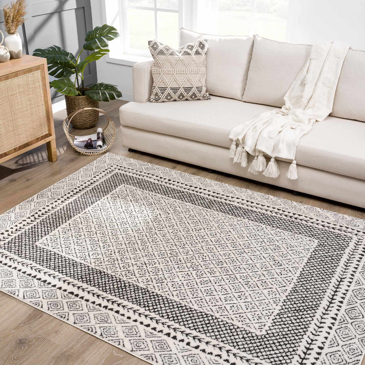 Julio Contemporary Style Black And Ivory Rug - The Rug Decor