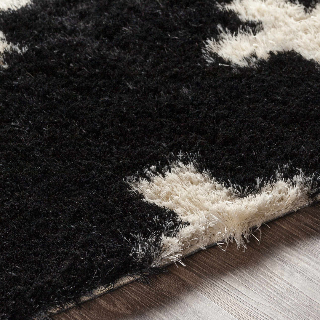 Keperra Modern Style Black And Ivory Hand Tufted Area Rug
