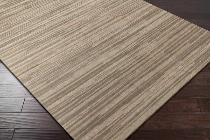 Beige hand-knotted wool area rug corner with modern abstract horizontal stripes