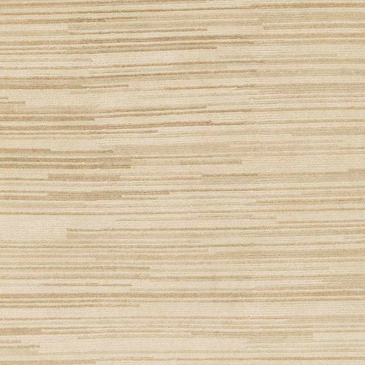 Beige hand-knotted wool area rug close-up with subtle abstract horizontal stripes