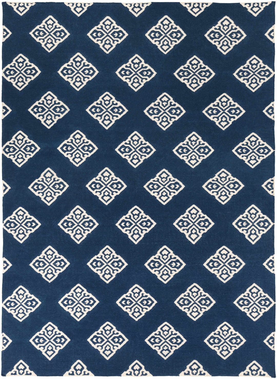 Blue hand-woven area rug with evenly spaced ivory diamond medallion pattern