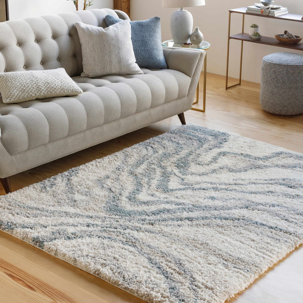 Lottery Modern Abstract Design Ivory And Blue Area Rug - The Rug Decor