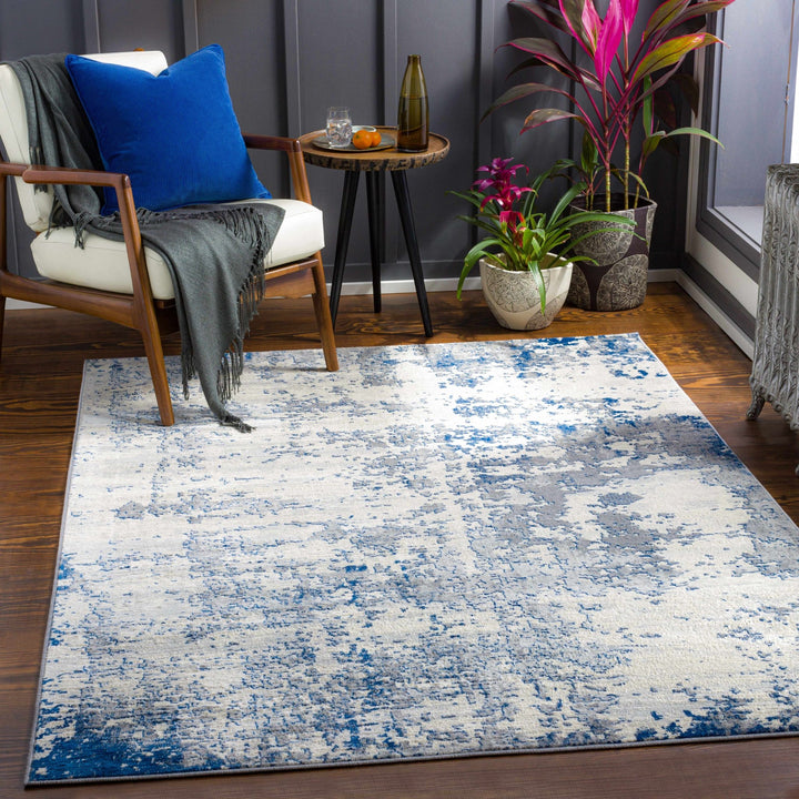 Lubao Ivory And Blue Modern Abstract Design Area Rug - The Rug Decor