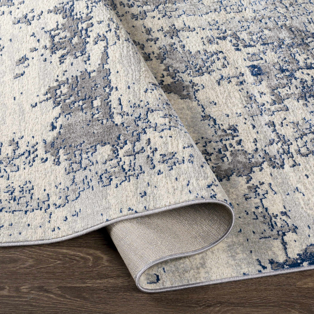 Lubao Ivory And Blue Modern Abstract Design Area Rug - The Rug Decor