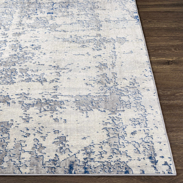 Lubao Ivory And Blue Modern Abstract Design Area Rug - The Rug Decor