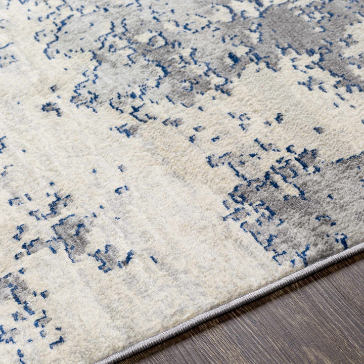 Lubao Ivory And Blue Modern Abstract Design Area Rug - The Rug Decor