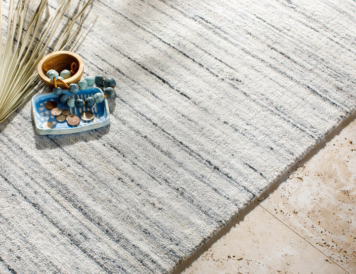 Lubigan Modern Abstract Design Silver And Ivory Area Rug - The Rug Decor