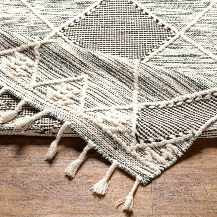 Mabua Tasseled Modern Black Hand Woven Jute & Wool Rug - The Rug Decor