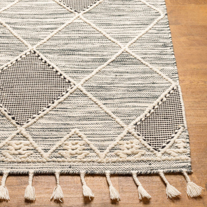 Mabua Tasseled Modern Black Hand Woven Jute & Wool Rug - The Rug Decor