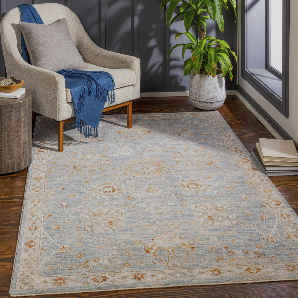 Mangham Blue And Ivory Traditional Style Area Rug - The Rug Decor