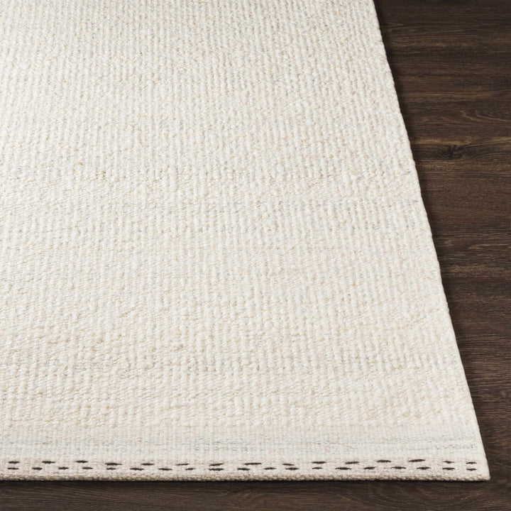 Manicahan Contemporary Solid Ivory And Cream Wool Rug - The Rug Decor