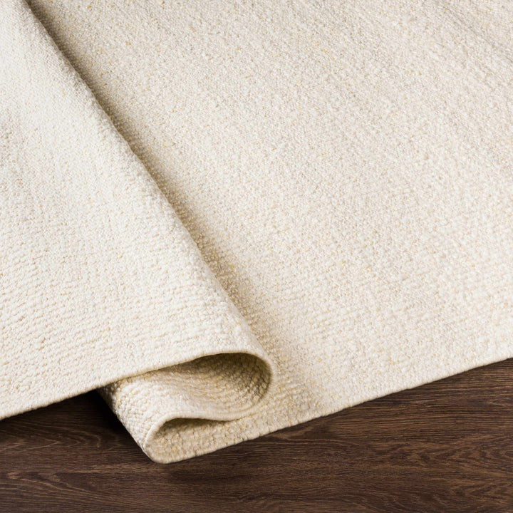 Manicahan Contemporary Solid Ivory And Cream Wool Rug - The Rug Decor
