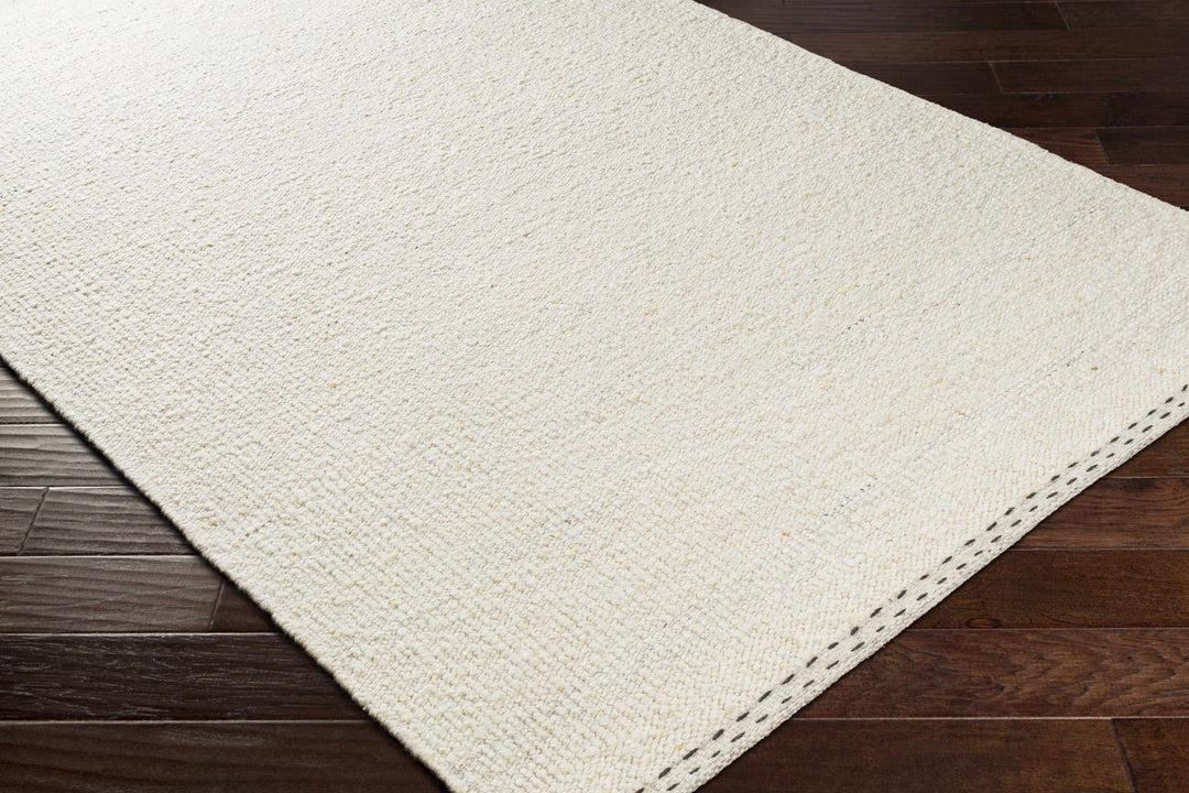 Manicahan Contemporary Solid Ivory And Cream Wool Rug - The Rug Decor