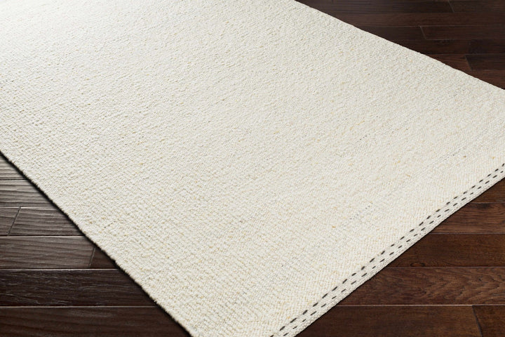 Manicahan Contemporary Solid Ivory And Cream Wool Rug - The Rug Decor