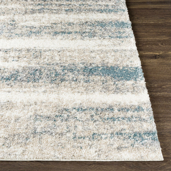 Manquiring Modern Abstract Design Blue And Ivory Area Rug - The Rug Decor
