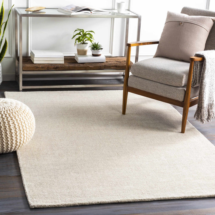 Mariba Modern Solid Design Ivory Hand Tufted Wool Rug - The Rug Decor
