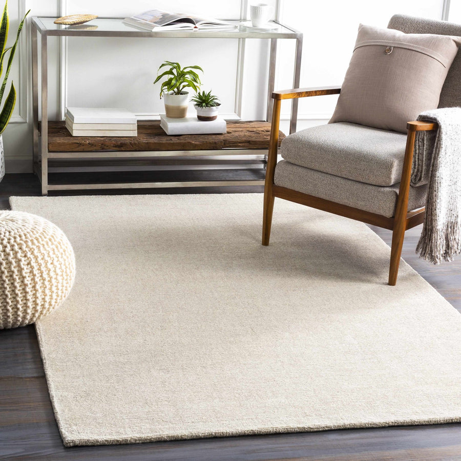 Mariba Modern Solid Design Ivory Hand Tufted Wool Rug - The Rug Decor