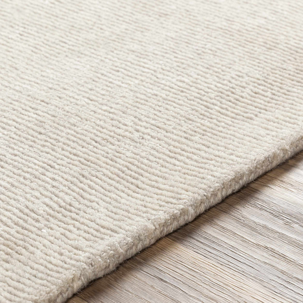 Mariba Modern Solid Design Ivory Hand Tufted Wool Rug - The Rug Decor