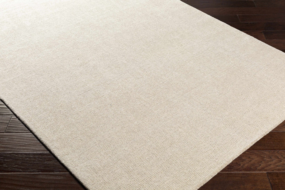 Mariba Modern Solid Design Ivory Hand Tufted Wool Rug - The Rug Decor