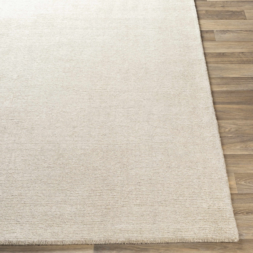 Mariba Modern Solid Design Ivory Hand Tufted Wool Rug - The Rug Decor