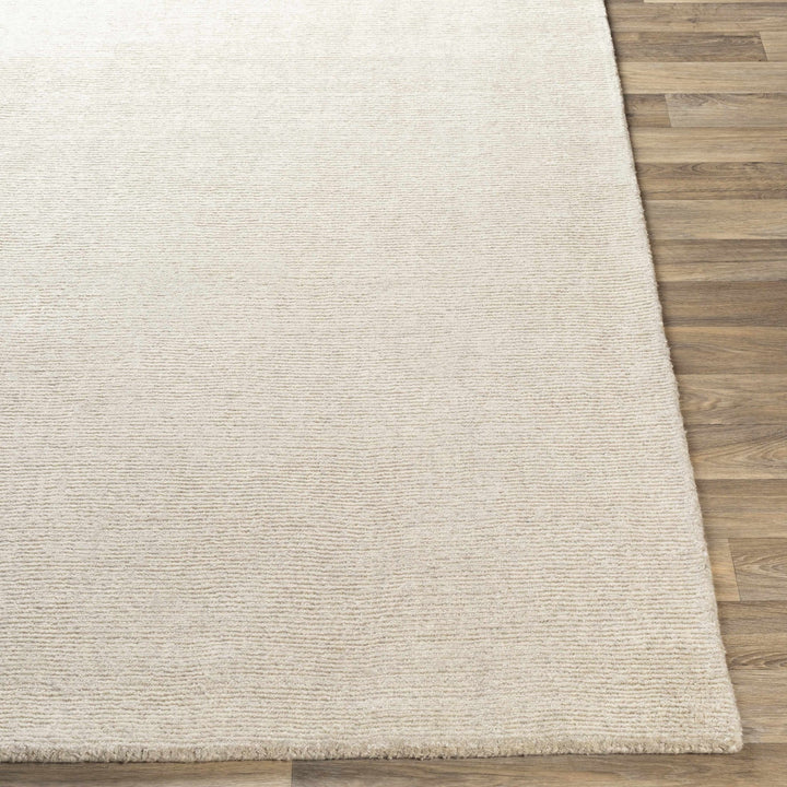 Mariba Modern Solid Design Ivory Hand Tufted Wool Rug - The Rug Decor
