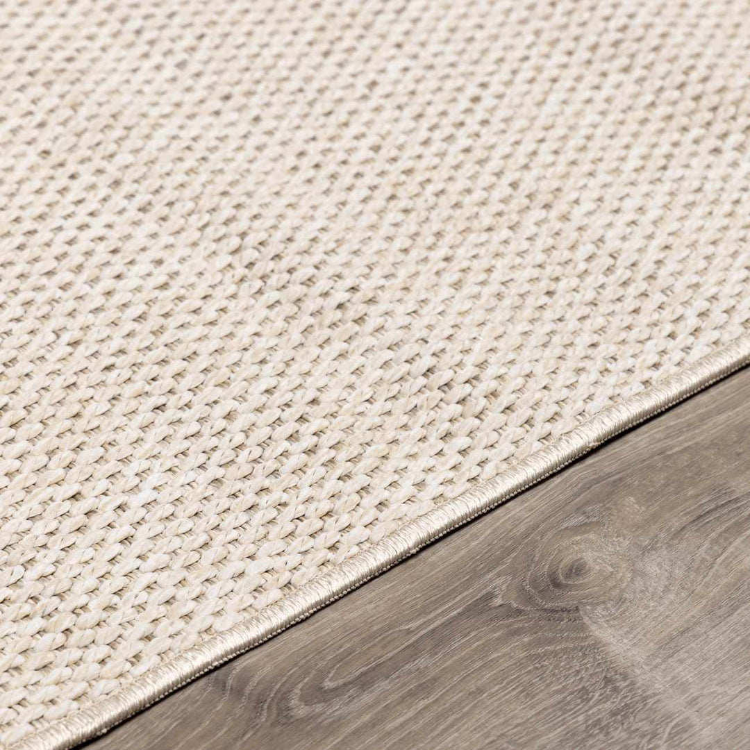 Midha Modern Solid Beige Machine Woven Rug - The Rug Decor