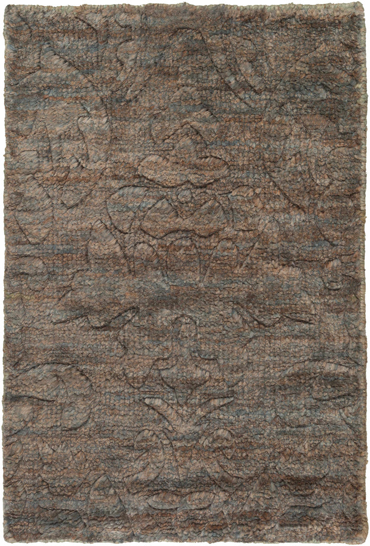 Brown jute rug with abstract hand-knotted pattern and textured surface
