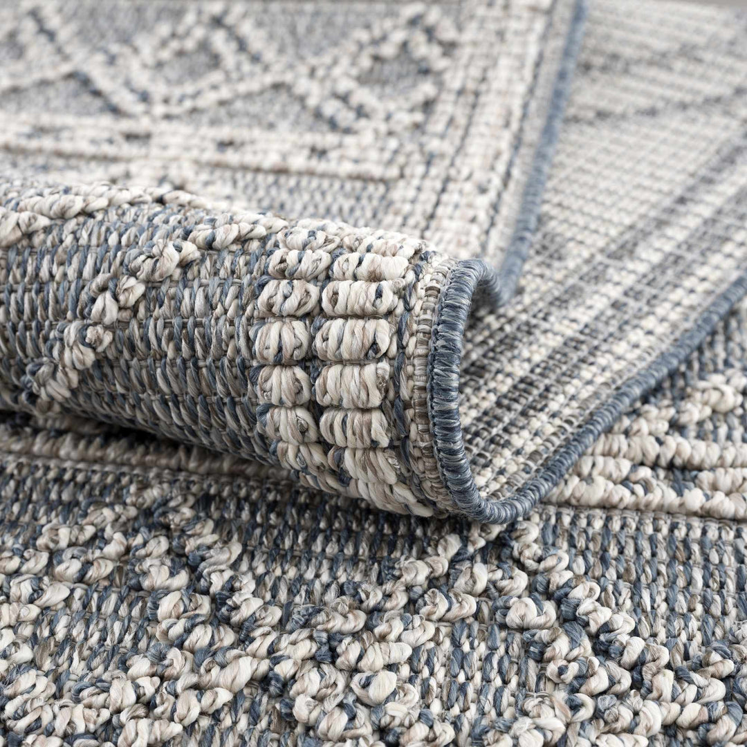 Modern Geometrical Carved Texture Blue and Ivory Outdoor Safe Area Rug - The Rug Decor