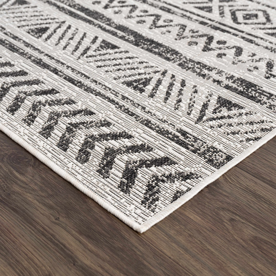 Modern Stripes Chevron Design Ivory and Charcoal Outdoor Safe Area Rug - The Rug Decor