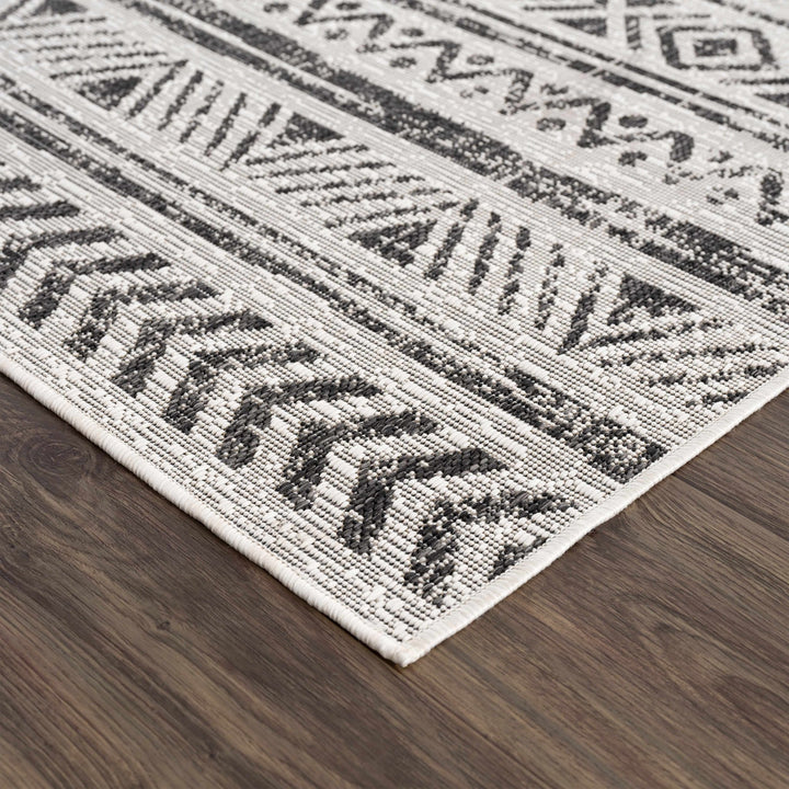 Modern Stripes Chevron Design Ivory and Charcoal Outdoor Safe Area Rug - The Rug Decor