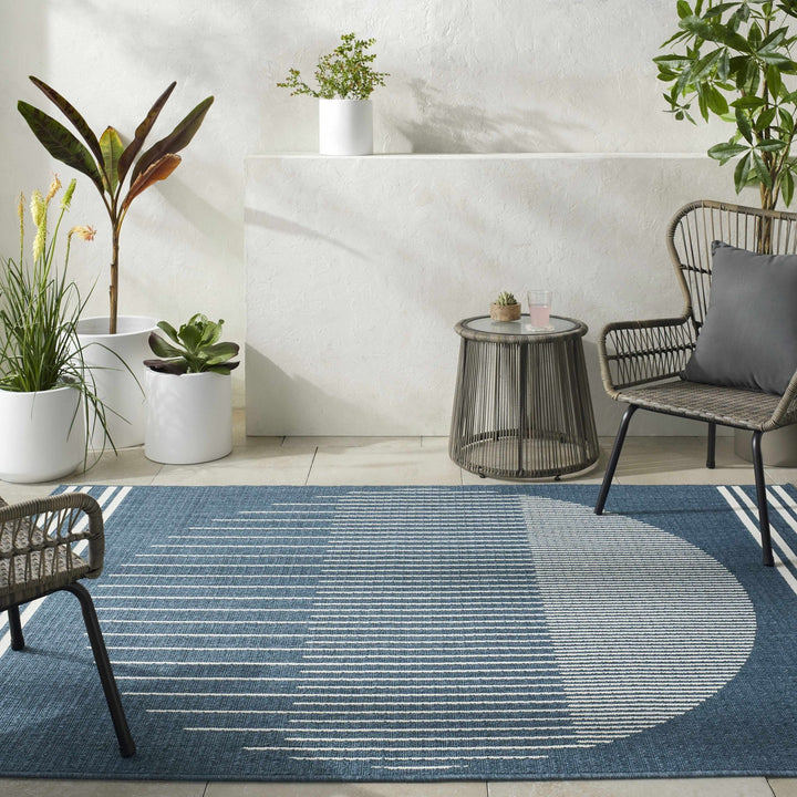 Nabil Contemporary Geometrical Blue And Ivory Area Rug - The Rug Decor
