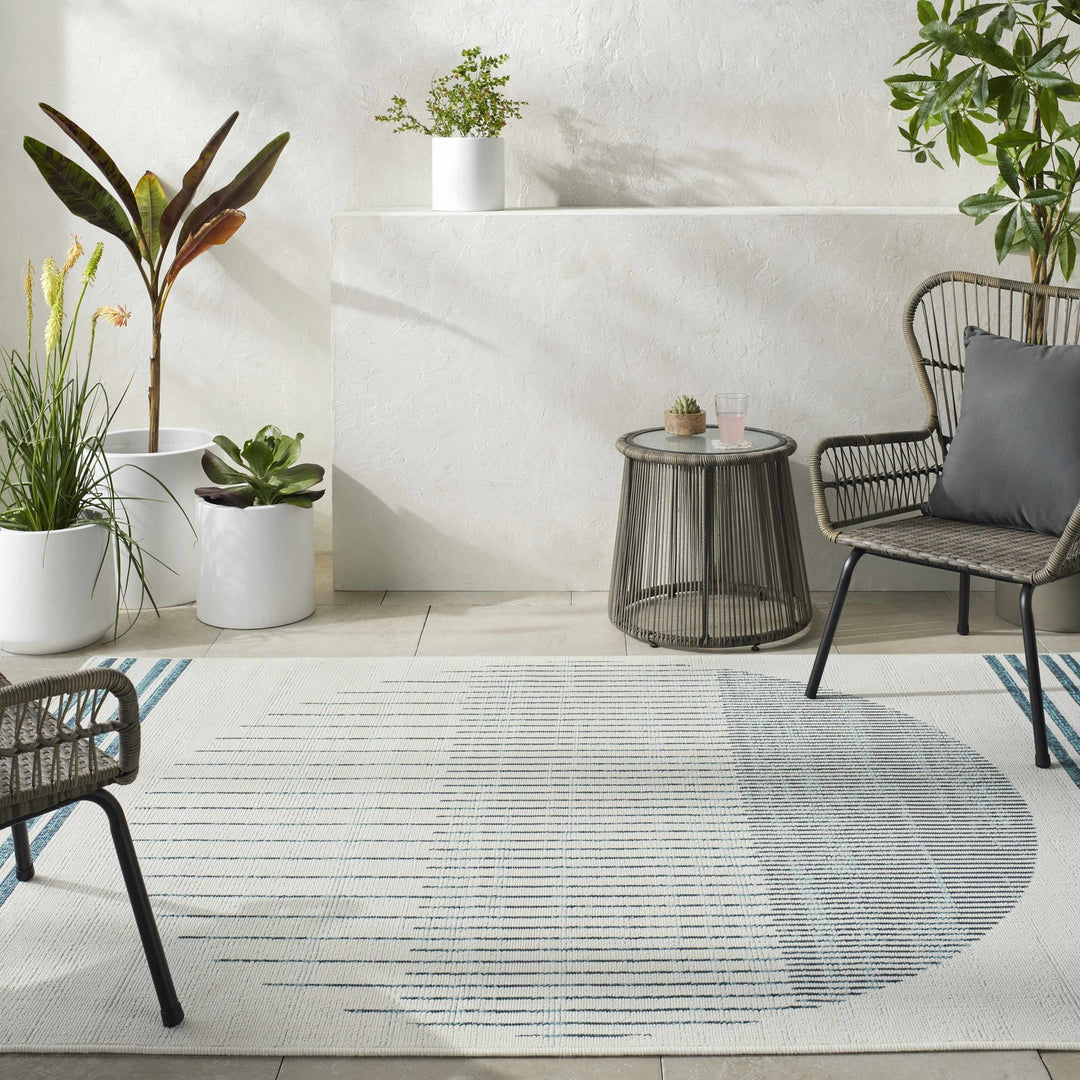 Nabil Contemporary Ivory And Teal Geometrical Rug - The Rug Decor