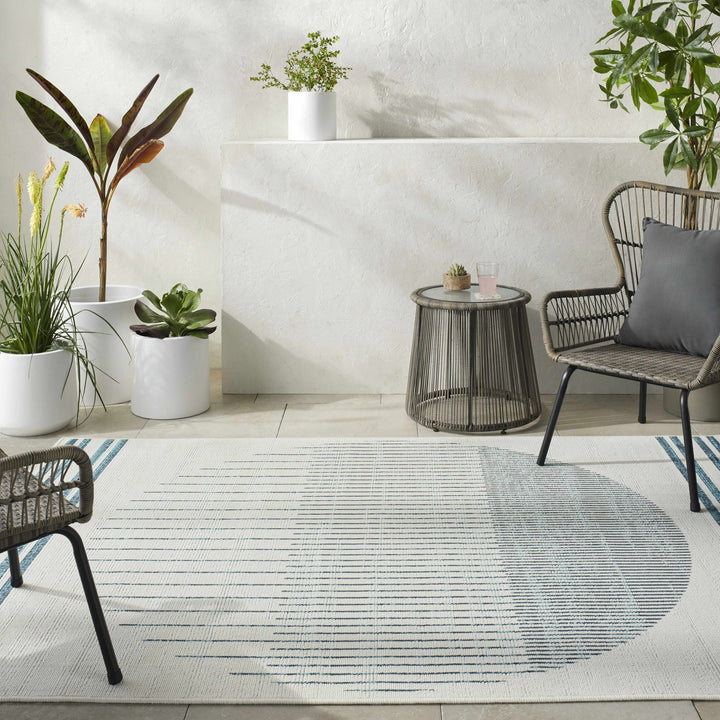 Nabil Contemporary Ivory And Teal Geometrical Rug - The Rug Decor