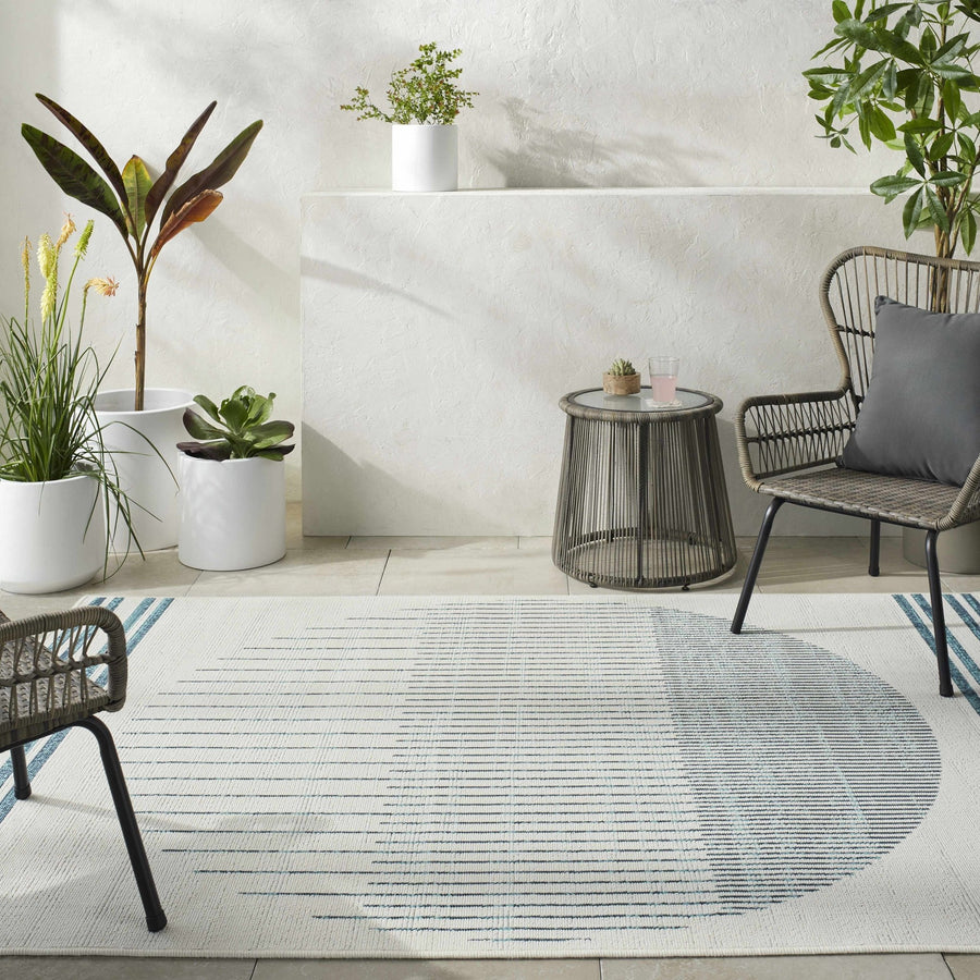 Nabil Contemporary Ivory And Teal Geometrical Rug - The Rug Decor