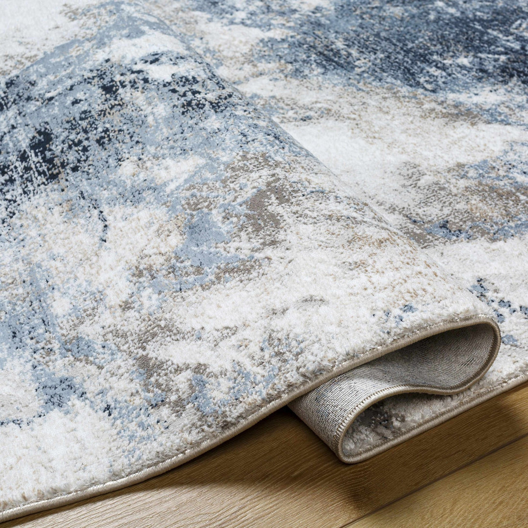 Napierville Modern Abstract Design Ivory And Blue Area Rug - The Rug Decor