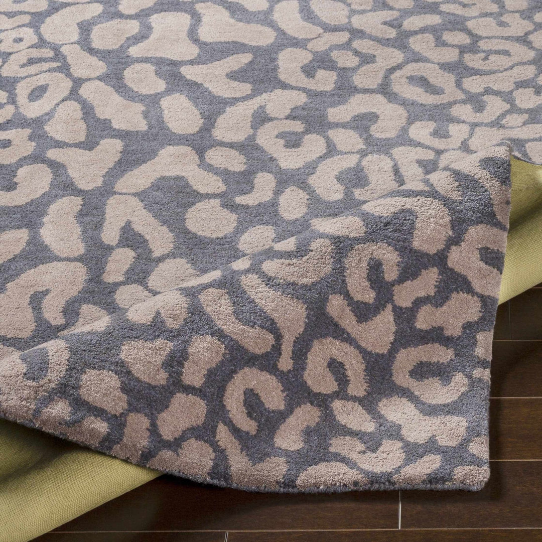 Neoma Contemporary Animal Charcoal And Brown Print Wool Rug - The Rug Decor
