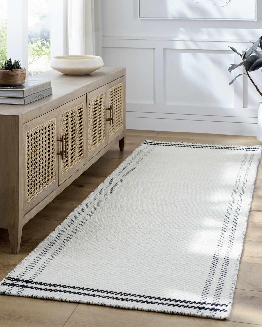 Nimue Ivory & Blue Bordered Hand Woven Wool Rug - The Rug Decor