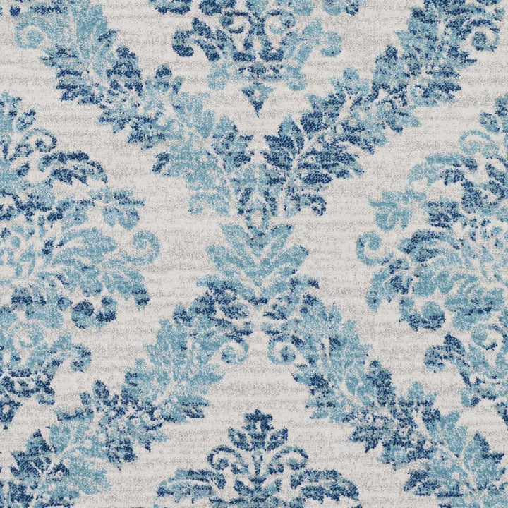 Oaklyn Modern Floral Design Teal And Ivory Area Rug