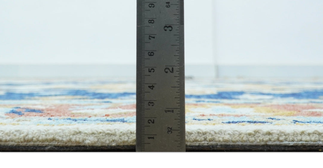 Ollie Traditional Blue And Ivory Hand Tufted Wool Rug - The Rug Decor