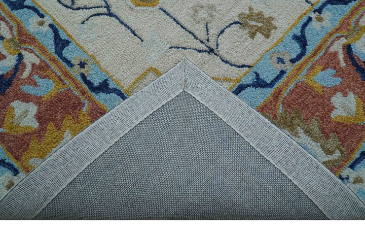 Ollie Traditional Blue And Ivory Hand Tufted Wool Rug - The Rug Decor