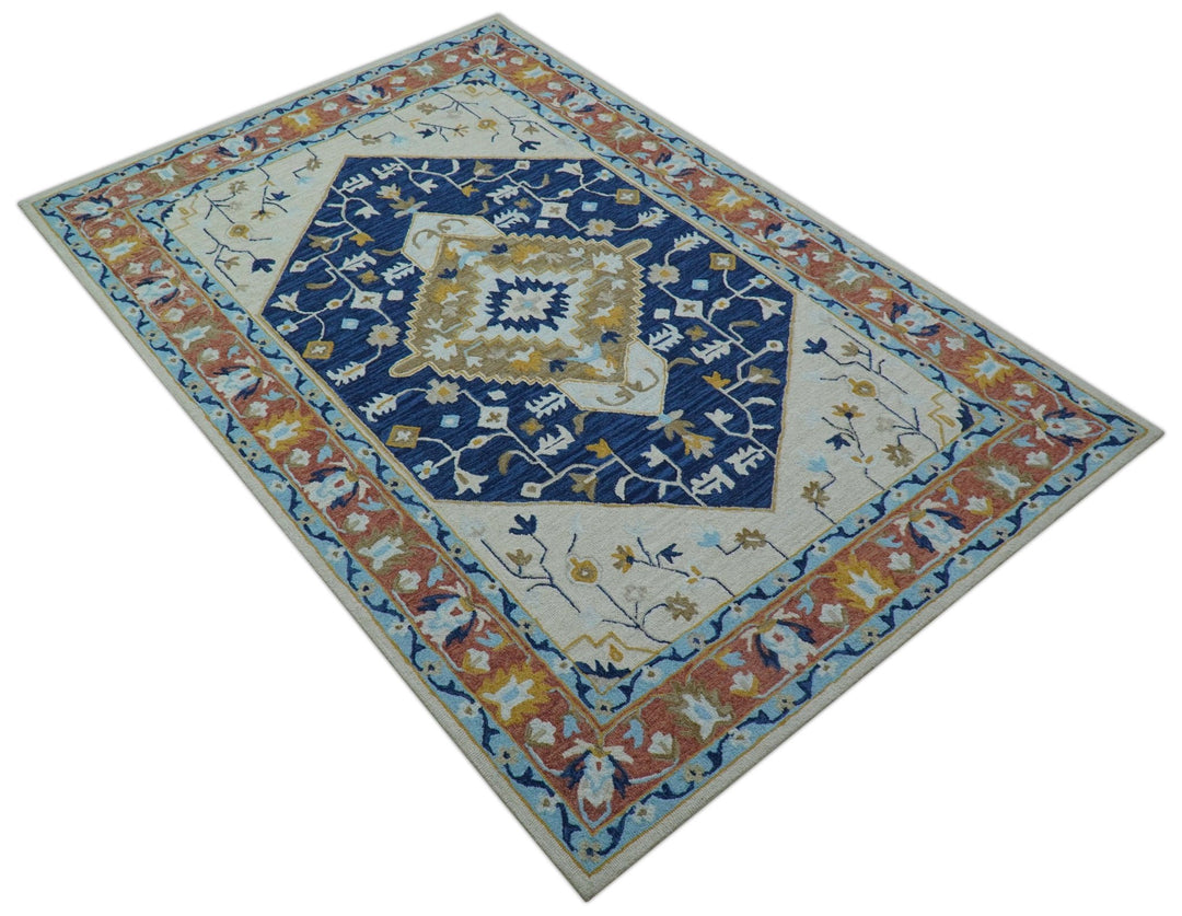 Ollie Traditional Blue And Ivory Hand Tufted Wool Rug - The Rug Decor