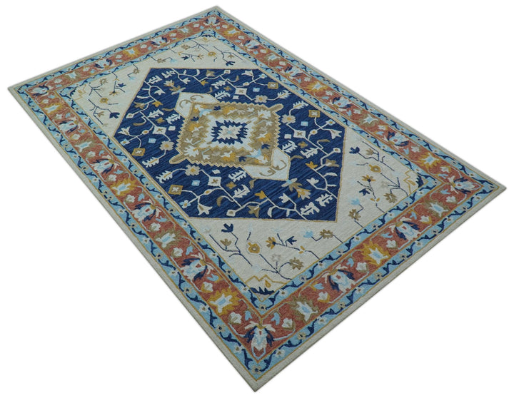 Ollie Traditional Blue And Ivory Hand Tufted Wool Rug - The Rug Decor