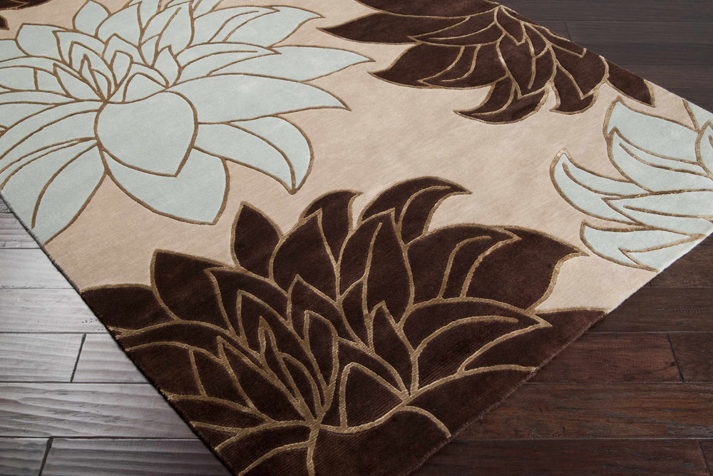Ivory area carpet with bold dark-brown floral design and light-blue leaves, angled view